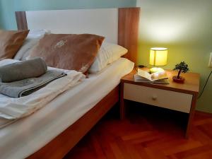 Postel nebo postele na pokoji v ubytování Amarena Apartment