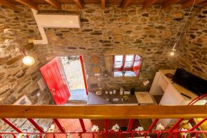 an overhead view of a kitchen in a stone house at Casa do Feitor - Douro - Quinta da Cabrida in Sendim