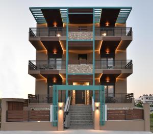 a rendering of a building with stairs in front at Niel Holiday Apartments, Panel Hospitality Homes & Villas in Leptokaria