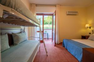 Letto o letti in una camera di Hotel Mira