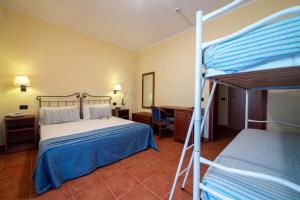 Letto o letti in una camera di Hotel Mira