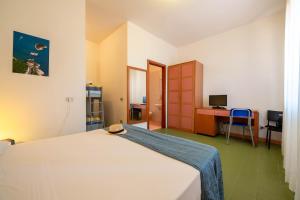Letto o letti in una camera di Hotel Mira