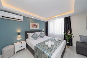 Postel nebo postele na pokoji v ubytování Studio Flat 10 min to Mermerli Beach in Antalya