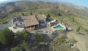 an aerial view of a house on a mountain at Cortijo Los Nopales in Puerto Lumbreras