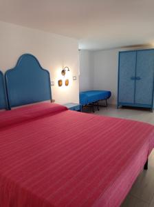 Cama o camas de una habitación en Casa Azzurra