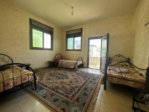 Postel nebo postele na pokoji v ubytování Hebron Hope Guesthouse + 33 fotografií