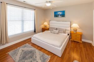 En eller flere senge i et værelse på The Sandbridge Dunes - Summer Moments 107 + 26 billeder