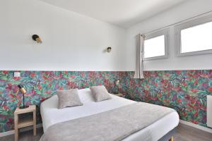 Postel nebo postele na pokoji v ubytování Hotel du Cap