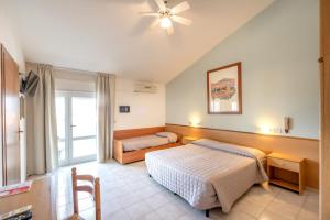 Voodi või voodid majutusasutuse Hotel Itta toas