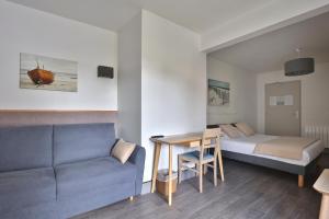 Postel nebo postele na pokoji v ubytování Hotel du Cap
