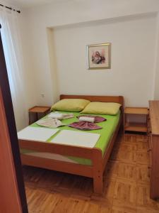 Posteľ alebo postele v izbe v ubytovaní Apartment KRISTINA