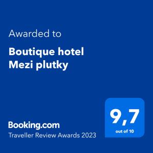 Boutique hotel Mezi plutky tesisinde sergilenen bir sertifika, ödül, işaret veya başka bir belge
