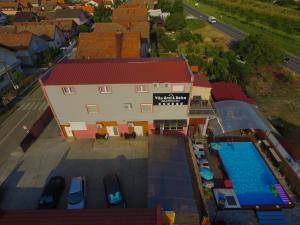 an overhead view of a building with a swimming pool at Apartments Vila Brzi & Beka in Šabac