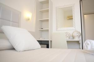 Postel nebo postele na pokoji v ubytování Hotel Sirena - Servizio spiaggia inclusive