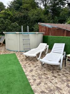 Zahrada ubytování Niluxe Apartment Kutaisi + 17 fotografií