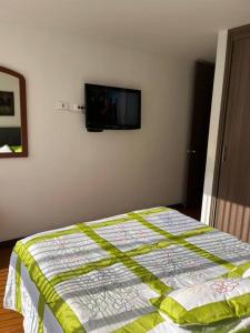 Posteľ alebo postele v izbe v ubytovaní Apartamento a 2 cuadras Cable Plaza en Manizales