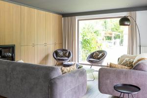 Posezení v ubytování Vakantiewoning Blijbos
