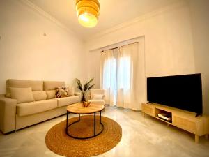TV a/nebo společenská místnost v ubytování Casa Castelar + 51 fotografií