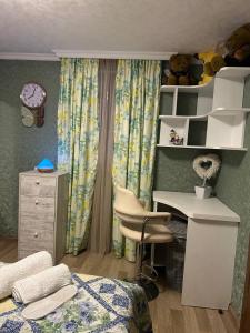 Postel nebo postele na pokoji v ubytování Niluxe Apartment Kutaisi