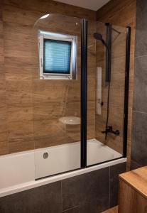 Et badeværelse på Adorable Holiday Apartment