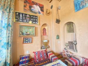 Postel nebo postele na pokoji v ubytování Riad Dar Barbara