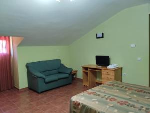 TV a/nebo společenská místnost v ubytování Hotel Condado de Miranda