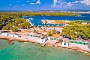 an aerial view of a resort on a lake at Whole house Ariela, 20m to the beach, has a barbecue, 2 terraces in Šibenik +12 photos