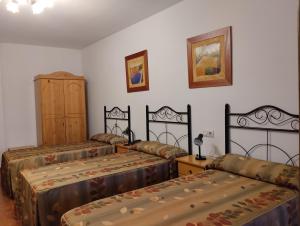 Postel nebo postele na pokoji v ubytování Hotel Condado de Miranda
