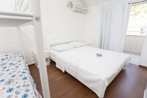 Postel nebo postele na pokoji v ubytování Apartment Petar