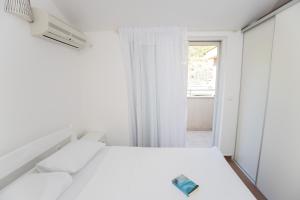 Postel nebo postele na pokoji v ubytování Apartment Petar
