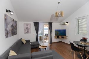TV a/nebo společenská místnost v ubytování Apartment Petar