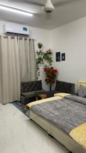 Llit o llits en una habitació de Jebel Akhdar،hostel