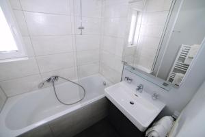 Kúpeľňa v ubytovaní Apartment Krabacher
