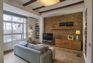 Televízia a/alebo spoločenská miestnosť v ubytovaní Enjoy Apartment 4 pax at Ruzafa with sunny terrace