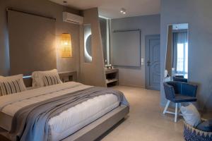 Posteľ alebo postele v izbe v ubytovaní White Suites Resort