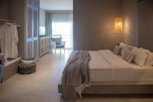 Posteľ alebo postele v izbe v ubytovaní White Suites Resort