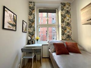 Postel nebo postele na pokoji v ubytování MMRent Jungle Room