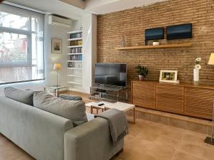 Televízia a/alebo spoločenská miestnosť v ubytovaní Enjoy Apartment 4 pax at Ruzafa with sunny terrace