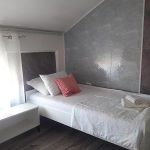 Postel nebo postele na pokoji v ubytování Apartmani Nis