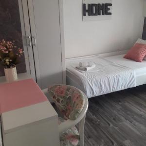 Postel nebo postele na pokoji v ubytování Apartmani Nis