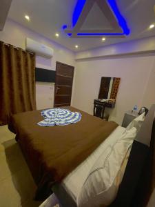 Postel nebo postele na pokoji v ubytování Sahara Pyramids Inn