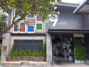 a store front of a building with a window at Nimman 9 in Chiang Mai