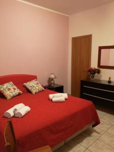 A bed or beds in a room at B&B Casa Valeria