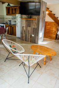 Una cocina o kitchenette en COSTA COM Cabañas