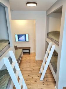 Postel nebo postele na pokoji v ubytování Hotellos