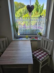 Fotografie z fotogalerie ubytování Ferienwohnung 1 Am Park v destinaci Divitz