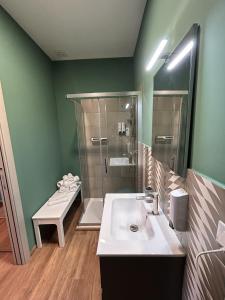 a bathroom with a sink and a shower at La Casa di Matilde in Barcellona-Pozzo di Gotto