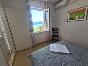 Posteľ alebo postele v izbe v ubytovaní Villa sea oasis Ratac + 35 fotografií