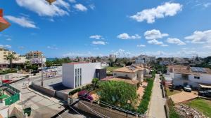 a view of a city from a building at Apartamentos La Goleta 1 in Denia