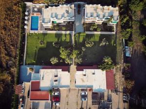 an aerial view of a house with a yard at Villa Rizia in Kolymbia